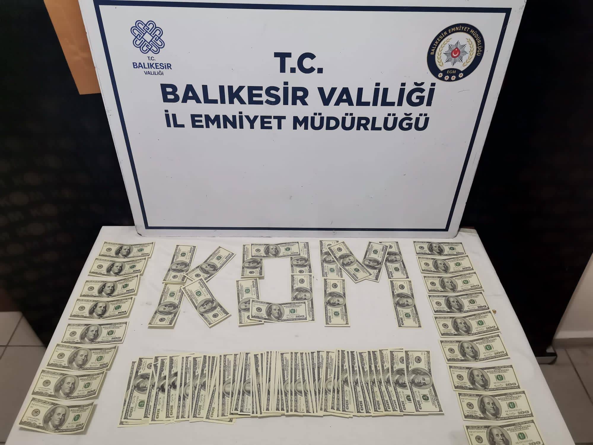 Balıkesir'in Bandırma ilçesinde gerçekleştirilen operasyonda 12 bin 600 sahte dolar ele geçirildi.